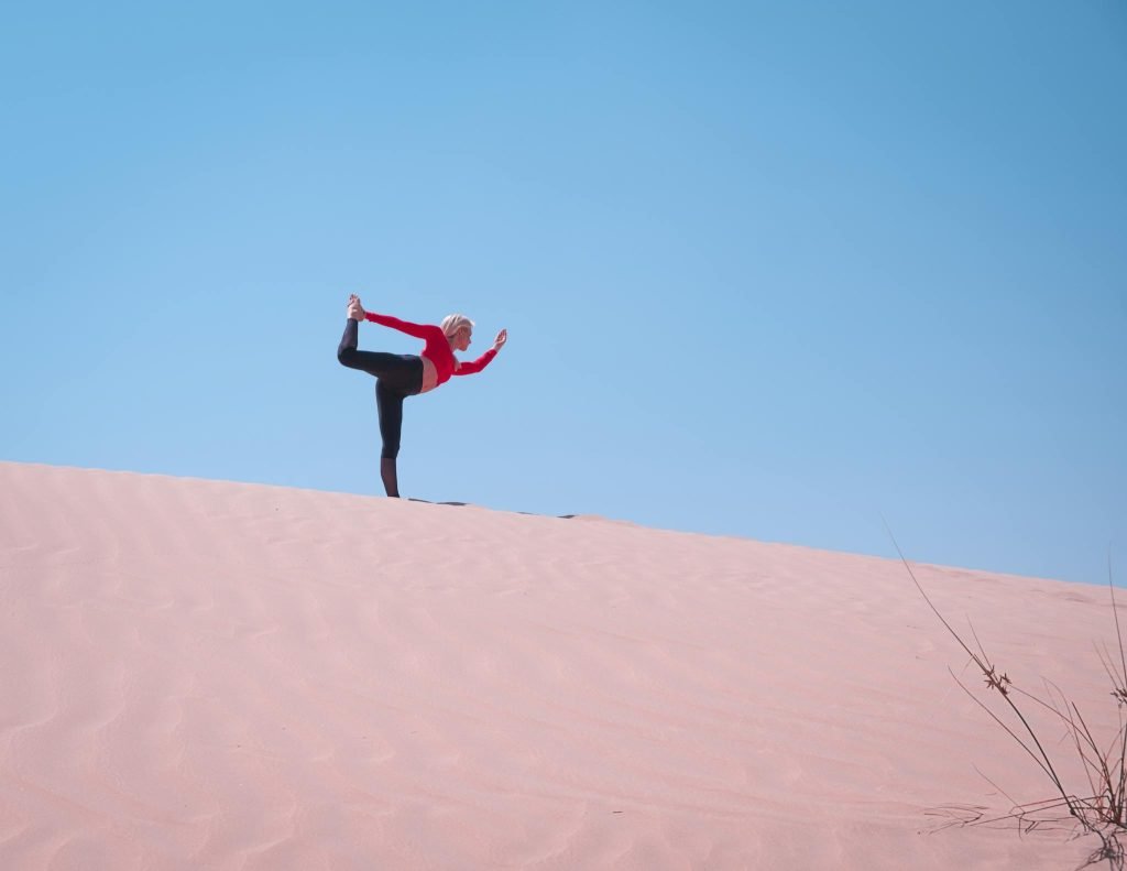 Person Standing on Desert