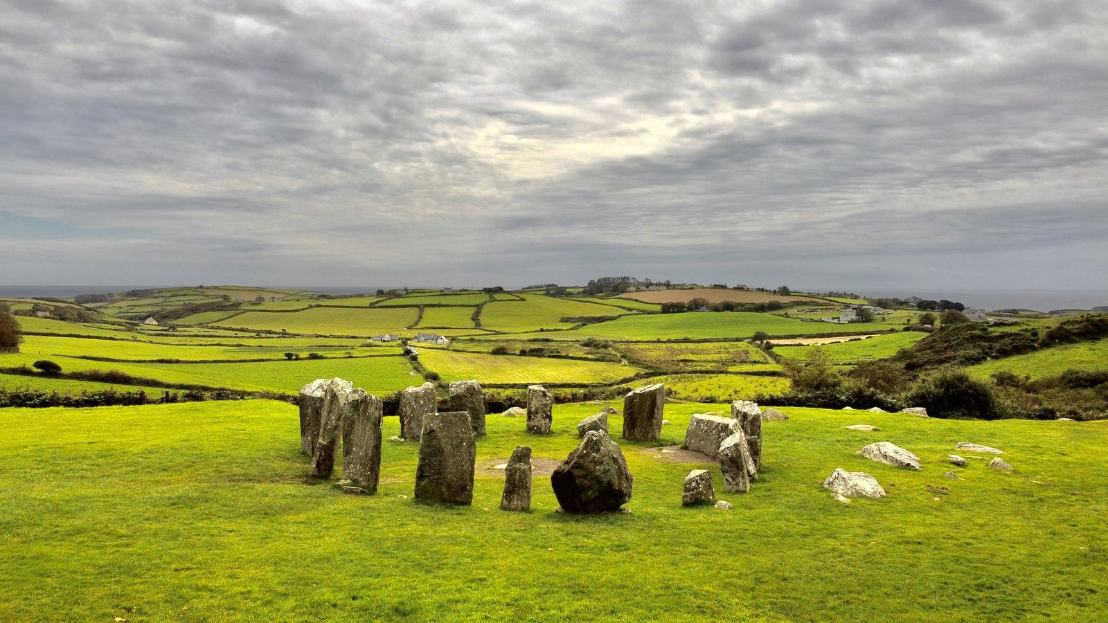An ancient stone circle on a field of green explains why Ireland is known as the Emerald Isle.