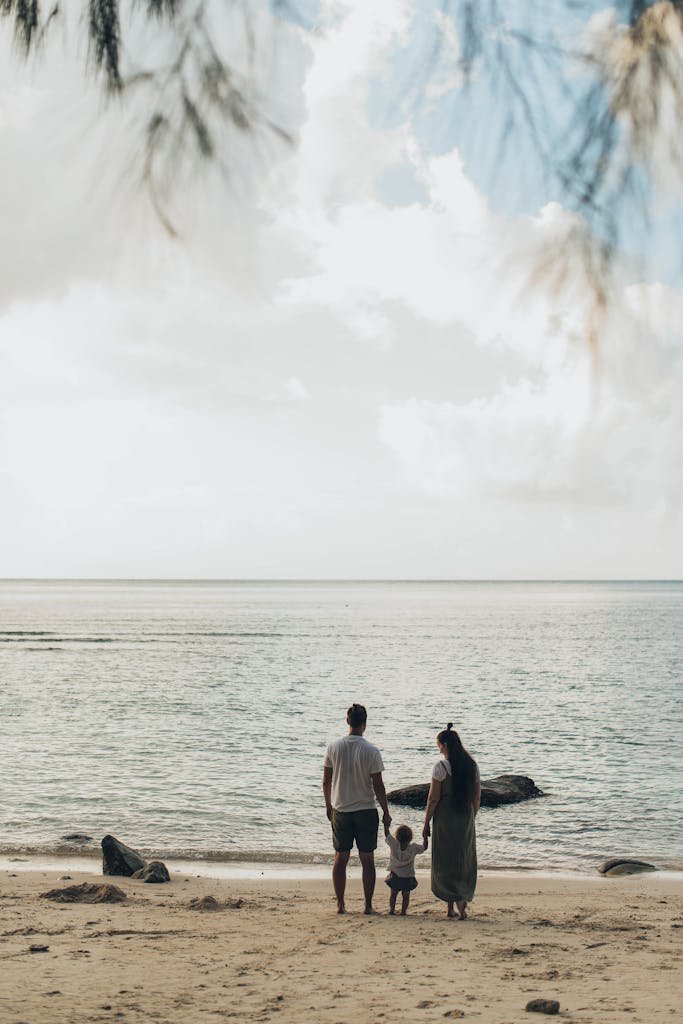 Woman and Man Standing at Shores - family travel quotes