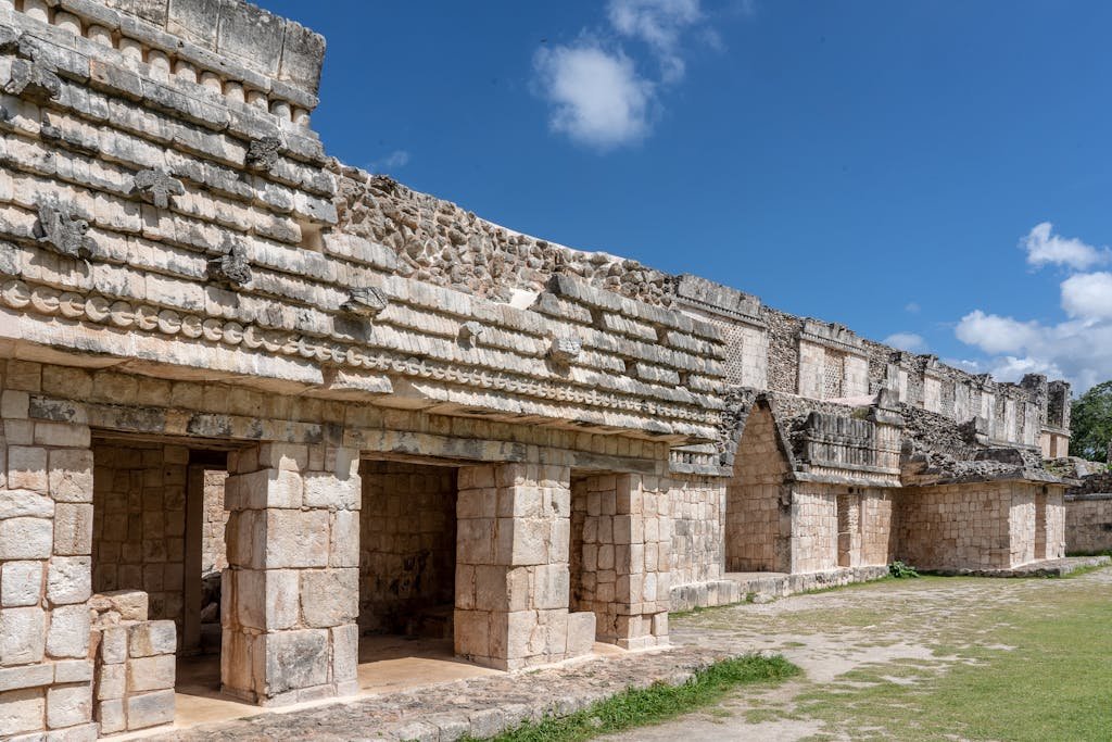 Explore the historic Mayan ruins of Uxmal with intricate stone architecture and cultural significance.